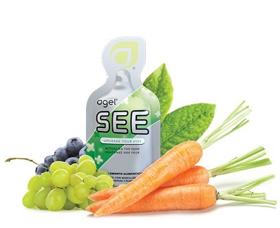 Agel SEE 'Upgrade Your Eyes' pouch surrounded by grapes, blueberries, and carrots